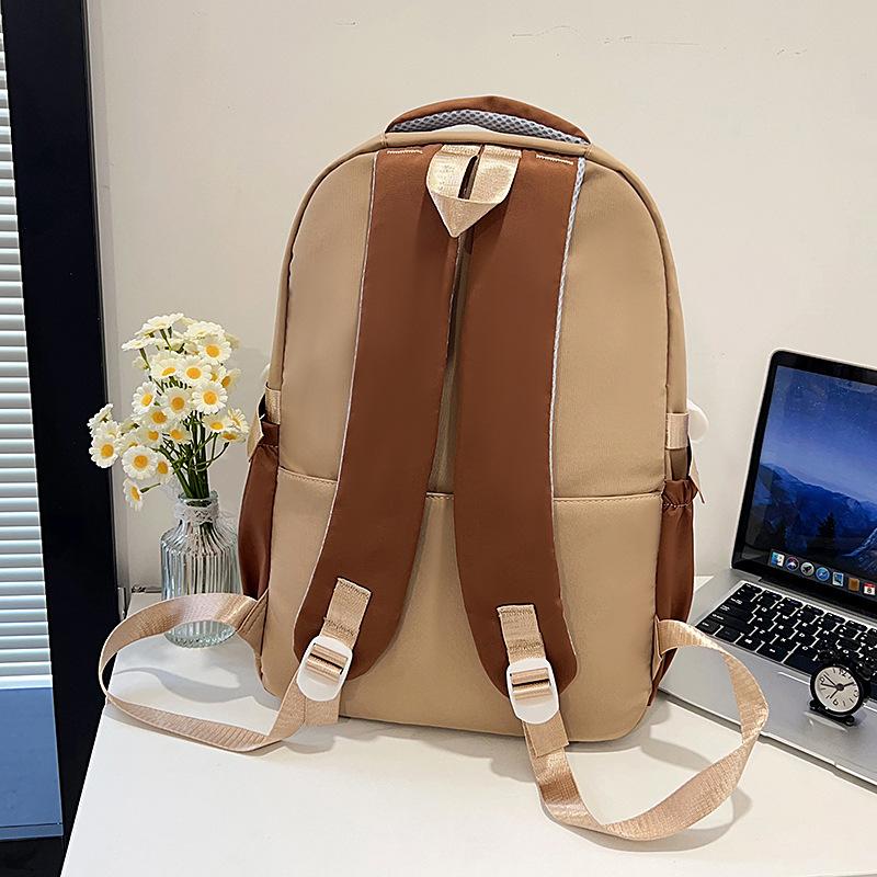 Hot-selling retro tooling wind contrasting color backpack male and female junior high school students versatile tide large-capacity schoolbag