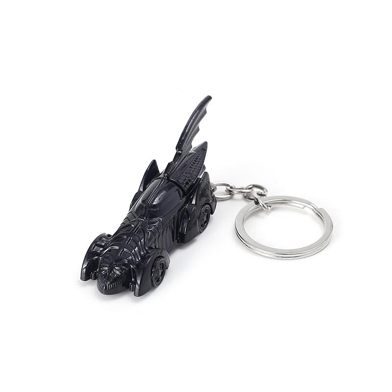 

«Хит продаж: игрушечная металлическая модель автомобиля и брелок для выживания»