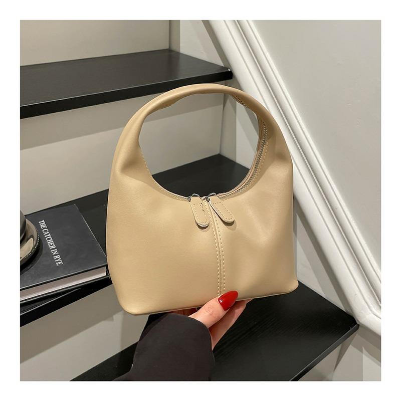 Eine trendige, vielseitige und stilvolle Handtasche, die sowohl modisch als auch schlicht ist