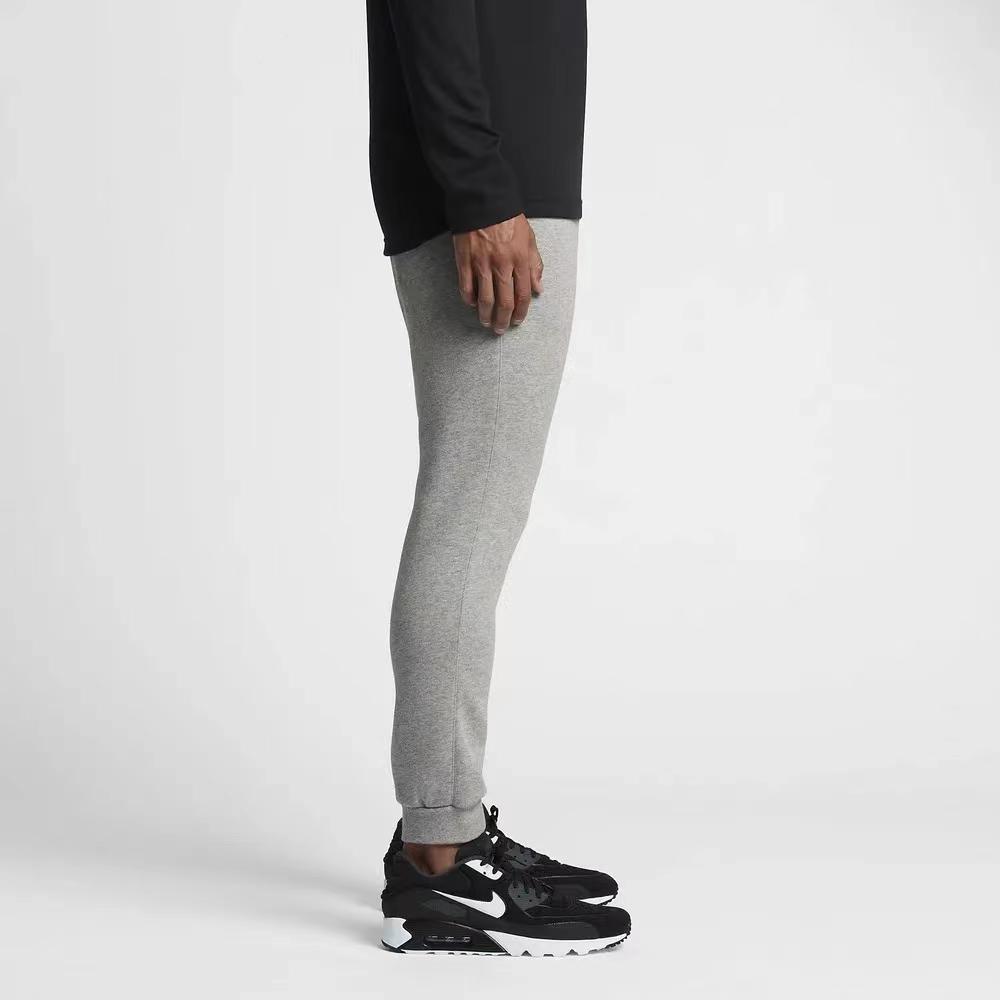 Nike Joggeri casual din tricot cu logo-ul de culoare uni Pantaloni pentru bărbați Gri 804409-063