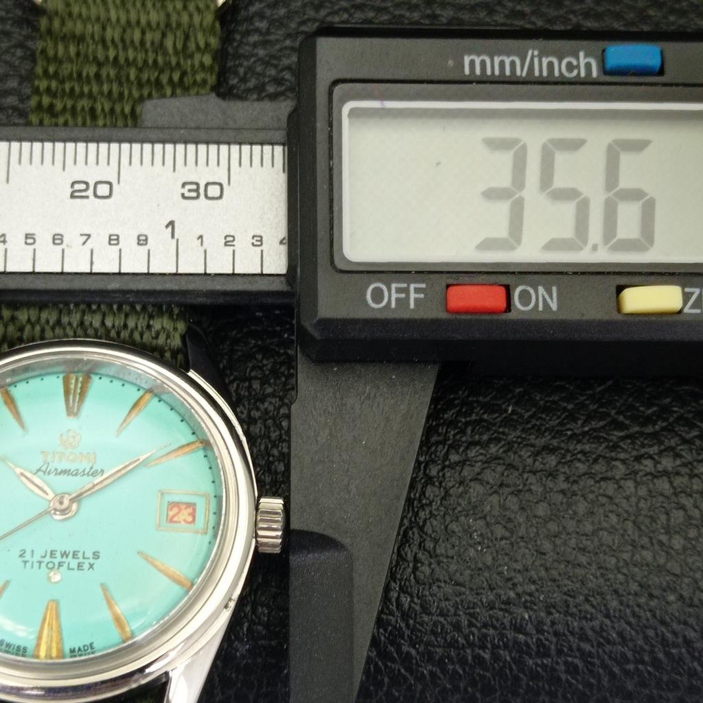 USED TITONI AIRMASTER TITOFLEX SWISS MENS TURQUOISE BLUE DIAL WATCH a432180-2 R110-a432180