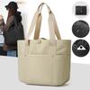 Women's portable folding storage bag with multiple compartments and adjustable shoulder strap for large capacity.