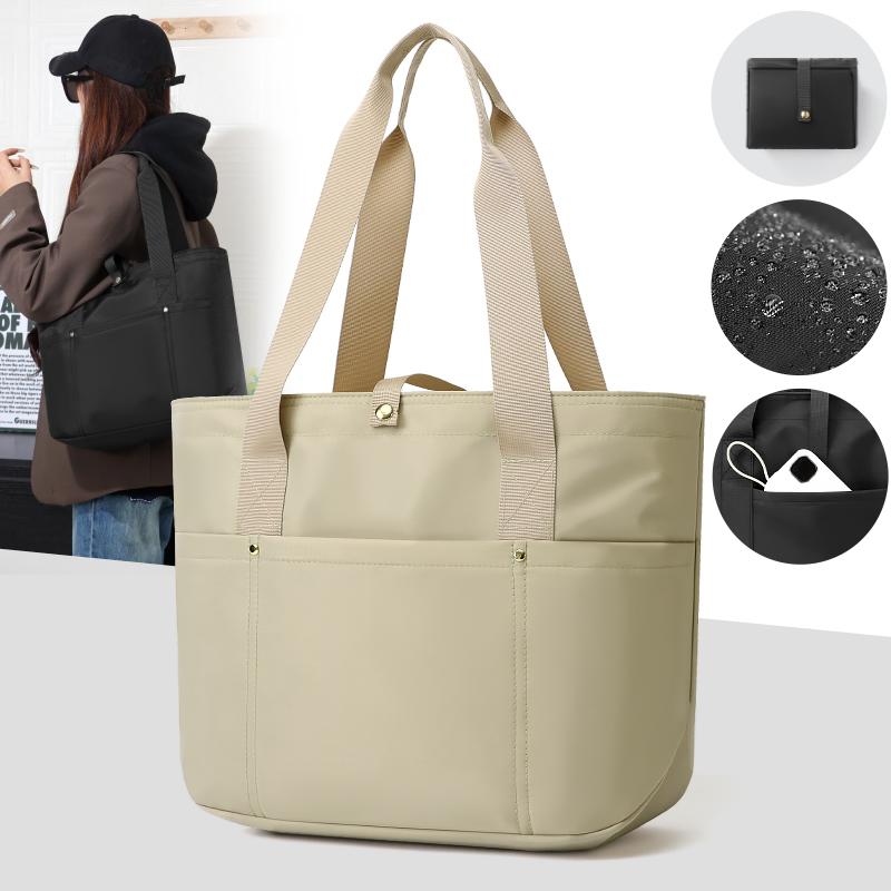 Women's portable folding storage bag with multiple compartments and adjustable shoulder strap for large capacity.
