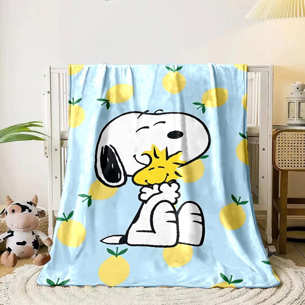 Snoopy hugging Woodstock on a blue background with scattered lemons. for all seasons blanket lunch break throw gift 80cm x 120cm