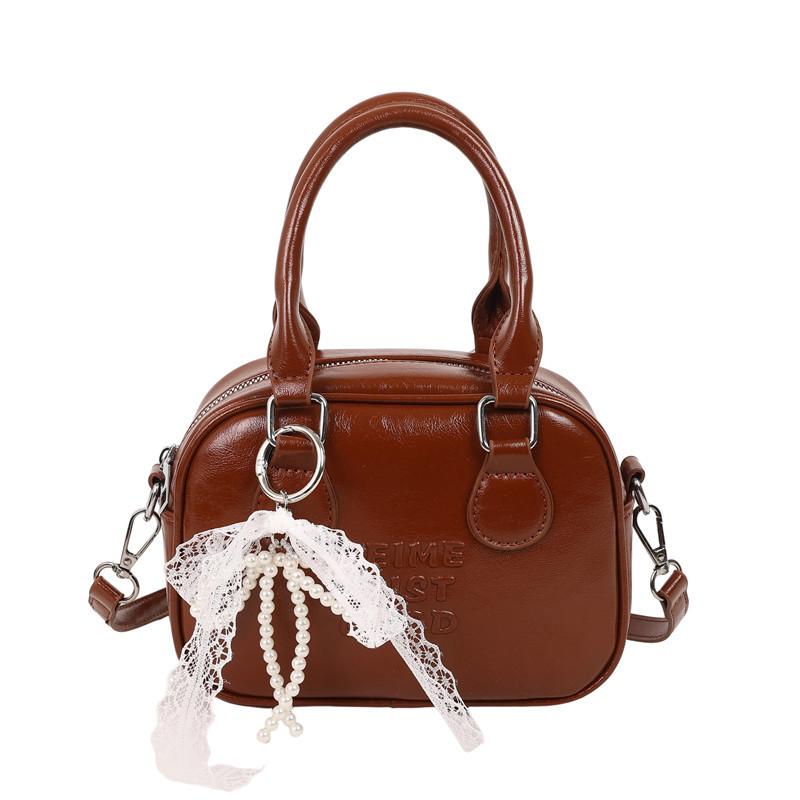 Spring and Summer Popular Korean Niche High-end Portable Bowling Bag Casual Versatile Temperament Foreign Style Messenger Women's Bag