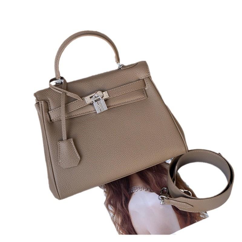 2025 neue High-End-Tasche mit breitem Schultergurt für Damen mit Litschi-Muster, einzelne Schulter-Umhängetasche, Nischentasche
