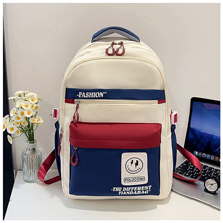 Hot-selling retro tooling wind contrasting color backpack male and female junior high school students versatile tide large-capacity schoolbag