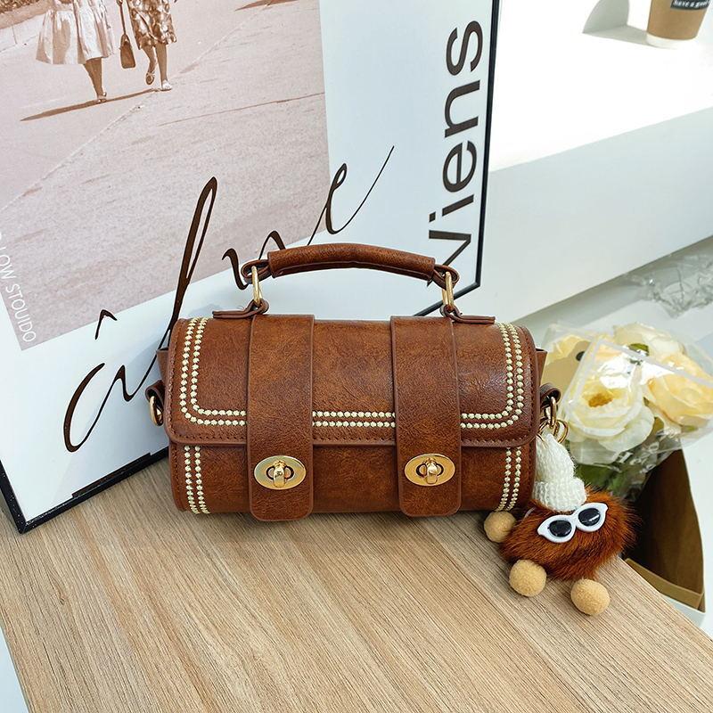 

Нишевый дизайн ретро маленькая женская сумка осень и зима новая модная универсальная сумка модная цилиндрическая сумка сумка-мессенджер single package коричневый