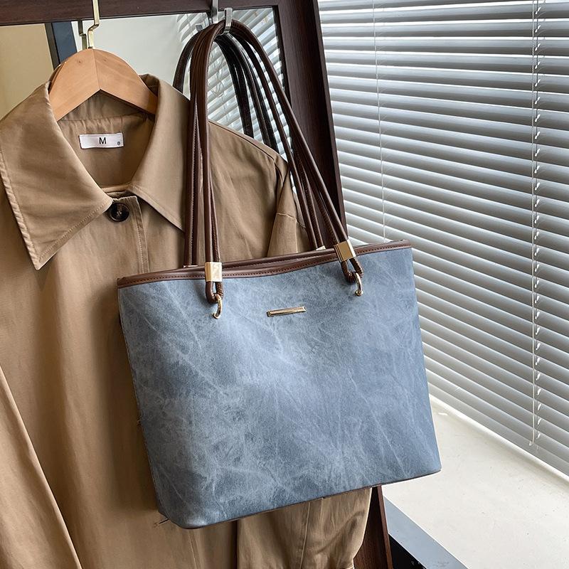 

Wholesale new products niche simple style design sense large capacity tote bag student class commuting versatile shoulder bag women