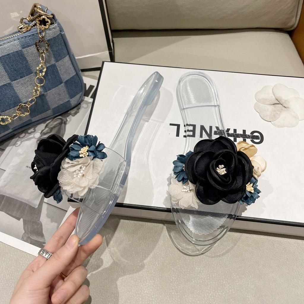 2025 summer new fashionable versatile flower one-word drag wear women's drag go out beach shoes flat slippers