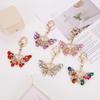 European & American Creative Rhinestone Butterfly Keychain: Unique Metal Moth Insect Charm for Backpack