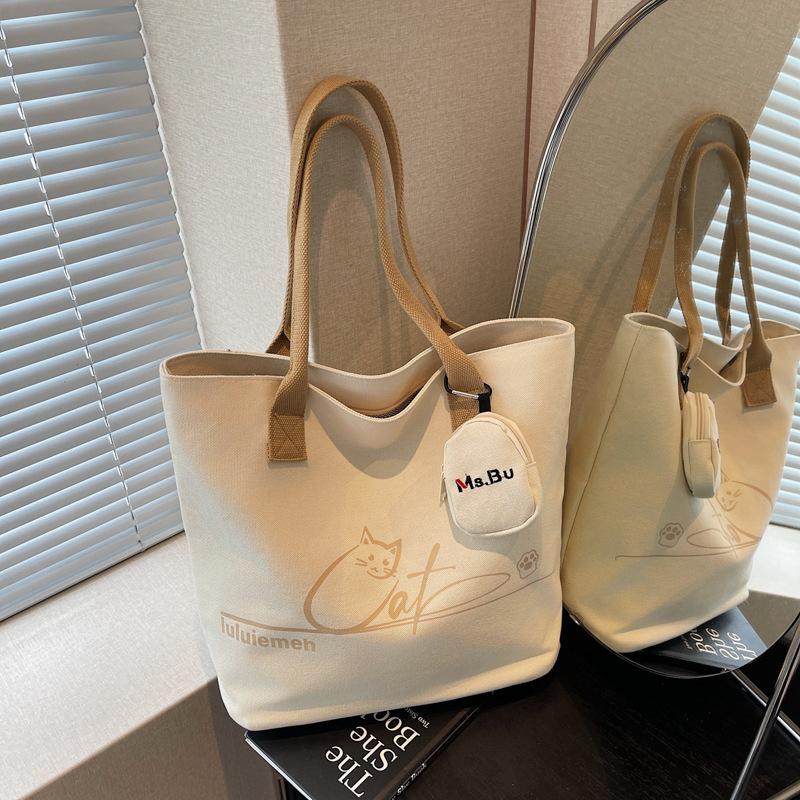 A Niche and Trendy Cartoon Canvas Bag with A Large Capacity for Commuting and A Shoulder Bag