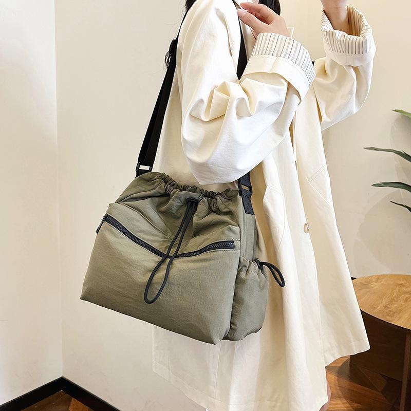 2025 new Japanese drawstring tote bag girls casual large-capacity niche design casual shoulder messenger bag