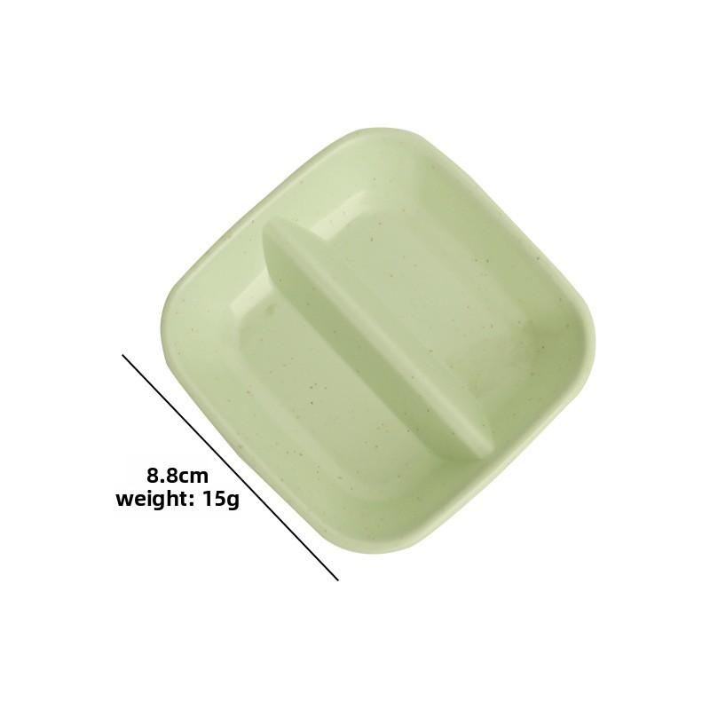 

Creative Double-Compartment Seasoning Dish for Home Kitchens