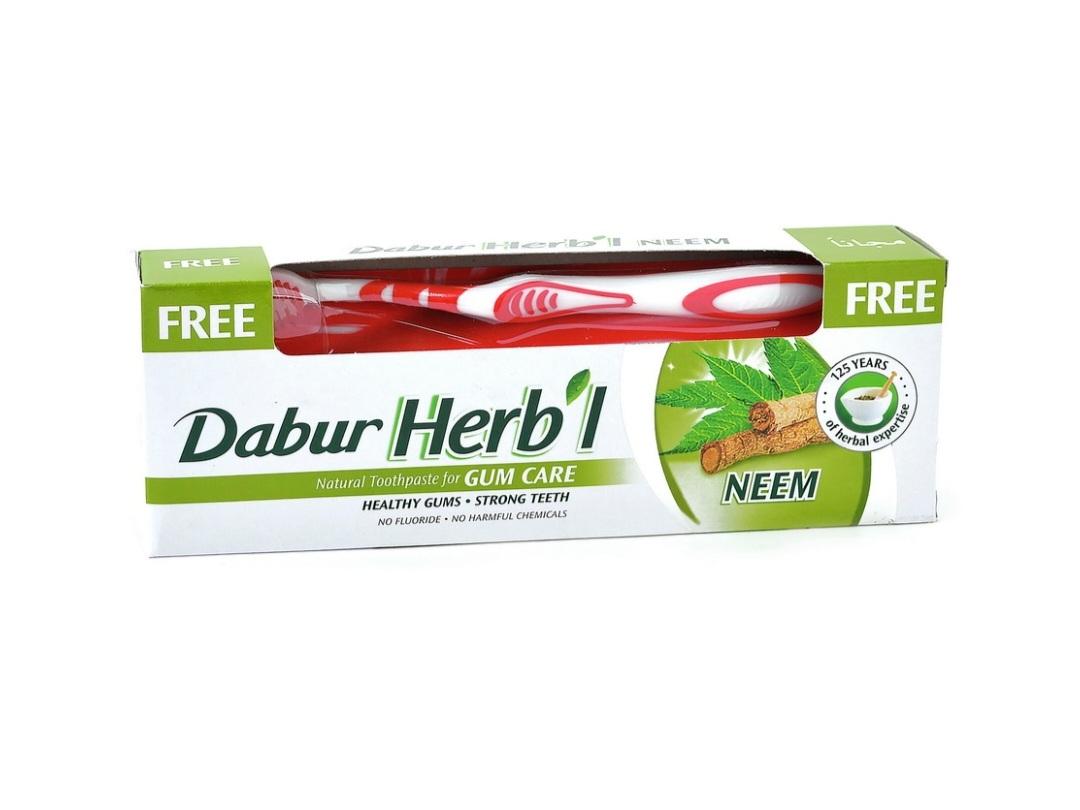 

Натуральна трав яна зубна паста Нім + БЕЗКОШТОВНА зубна щітка - 150 г Dabur 1 pcs