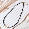 Stainless Steel Colorfast Light Luxury Necklace with Retro Black Glass Beads – Fashionable Clavicle Chain Choker