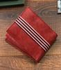 Men's wallet made of natural leather decorated with crosswise stripes