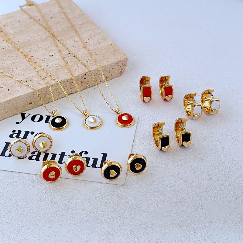 

Fashion Light Luxury Leather Inlaid Metal Heart Stud Earrings & Necklace Set