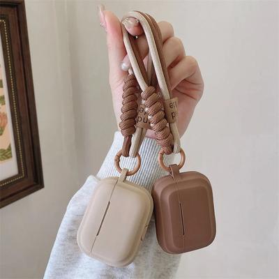 Karamellfarbene, weiche Silikon-Kopfhörerhülle mit Armband zur Sturzprävention für Paare für Airpods 2 3 4 Pro 2 Bluetooth-Ladebox-Hülle