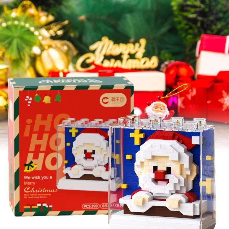 Kreatives Weihnachtsgeschenk Baustein-Set mit Weihnachtsmann und Feiertagsthema