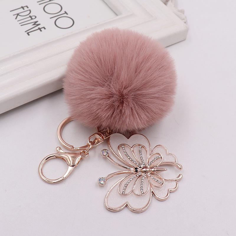 Exquisite Butterfly Plush Fur Ball Keychain for Bags, Cars, and Luggage.