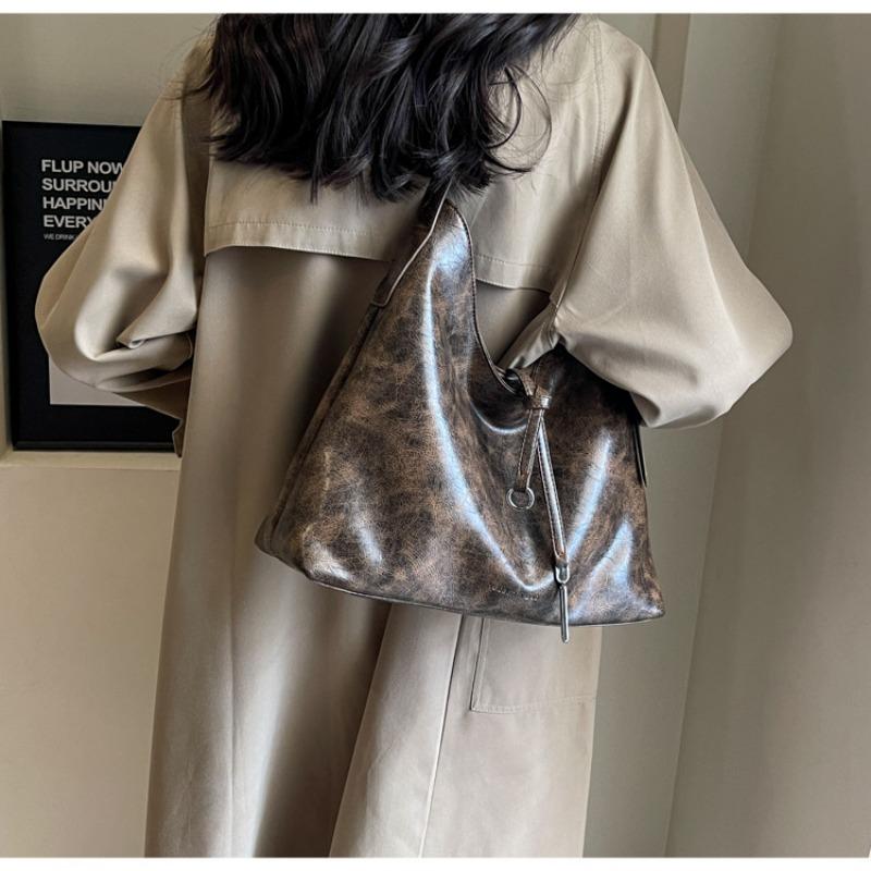 Retro high-end sense fashion large-capacity bag women's new versatile wasteland wind tote bag shoulder bag