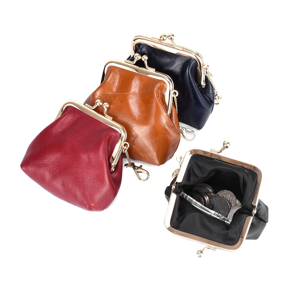 Retro clip change bag women's European and American, first layer oil wax cowhide Ins small earphones coin bag storage bag