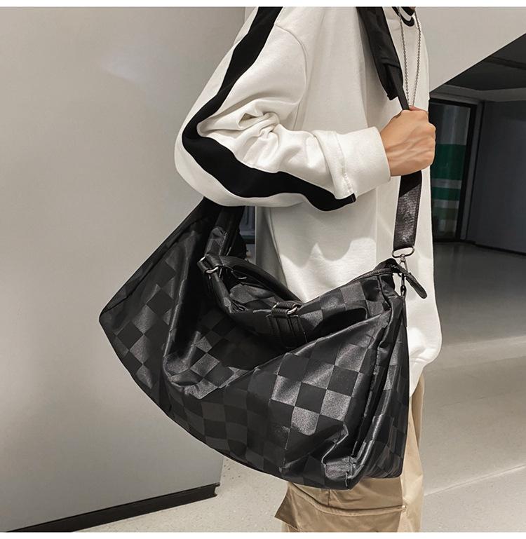 Large-capacity short-haul travel bag, shoulder messenger fitness bag, simple and lightweight boarding bag, unisex.