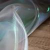 Buntes glitzerndes Netzgewebe Illusionäre Farbfotografie Hintergrund Transparentes Gaze-Kleid Performance-Kleidung Stoff