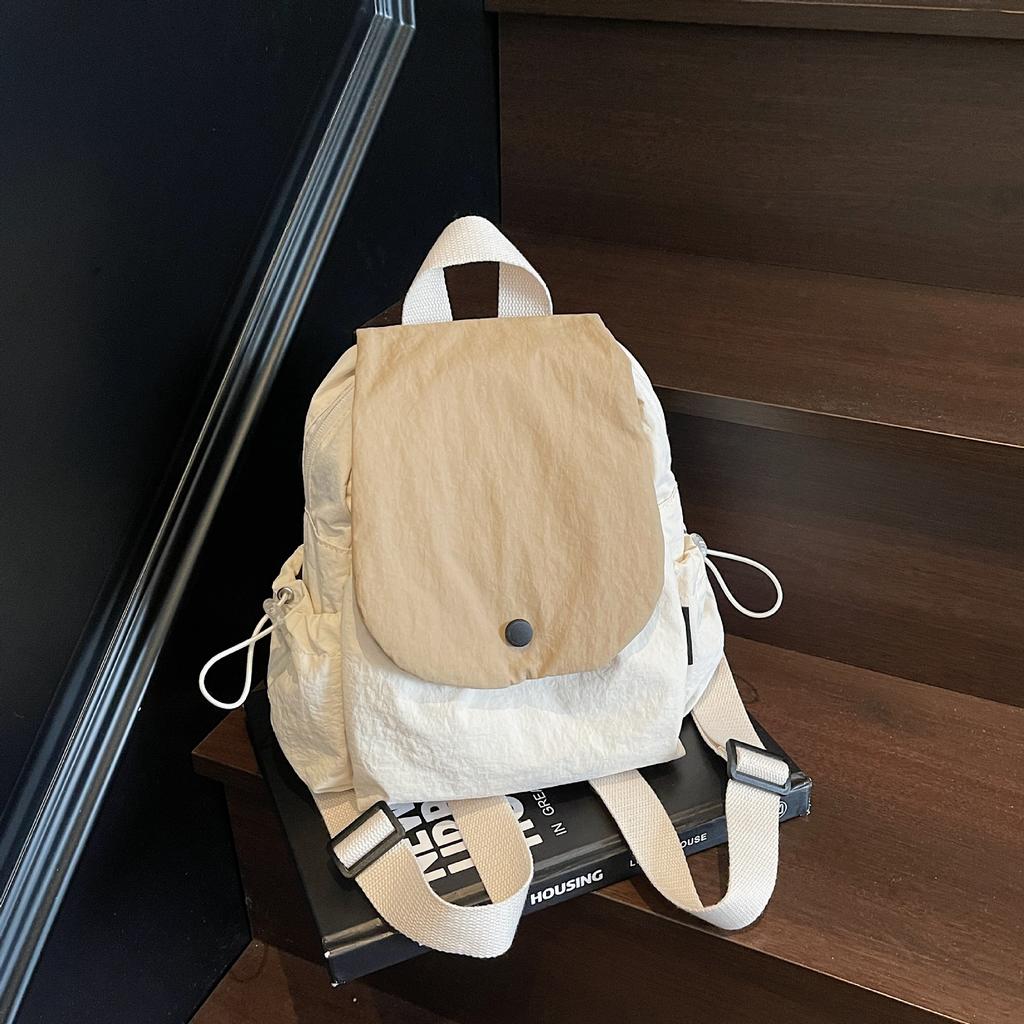 New Large Capacity Multi Functional Lightweight Simple and Fashionable Water Repellent Backpack for Men and Women.