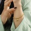 Fashion 18K Gold Elastic Rope Round Bead Titanium Steel Bracelet Niche High-End Hand Jewelry Does Not Fade