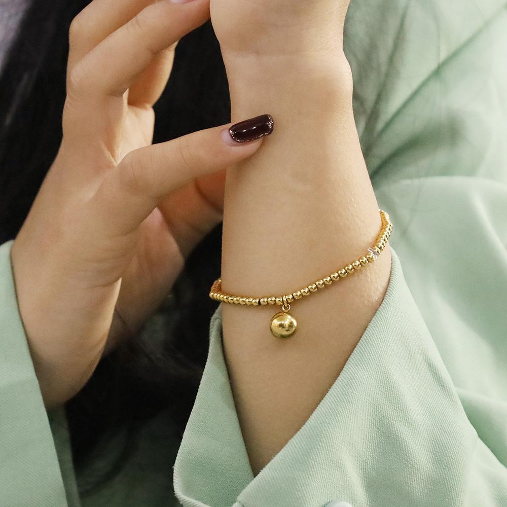 Fashion 18K Gold Elastic Rope Round Bead Titanium Steel Bracelet Niche High-End Hand Jewelry Does Not Fade