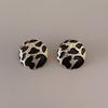 Korean-French Chic Leopard Print Round Earrings: Women's Fashion Studs with Unique Design and Simple Pattern.