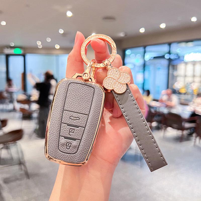 Toyota Key Cover for Camry, RAV4, Corolla, Levin, Avalon: Stylish Shell Buckle for Women.