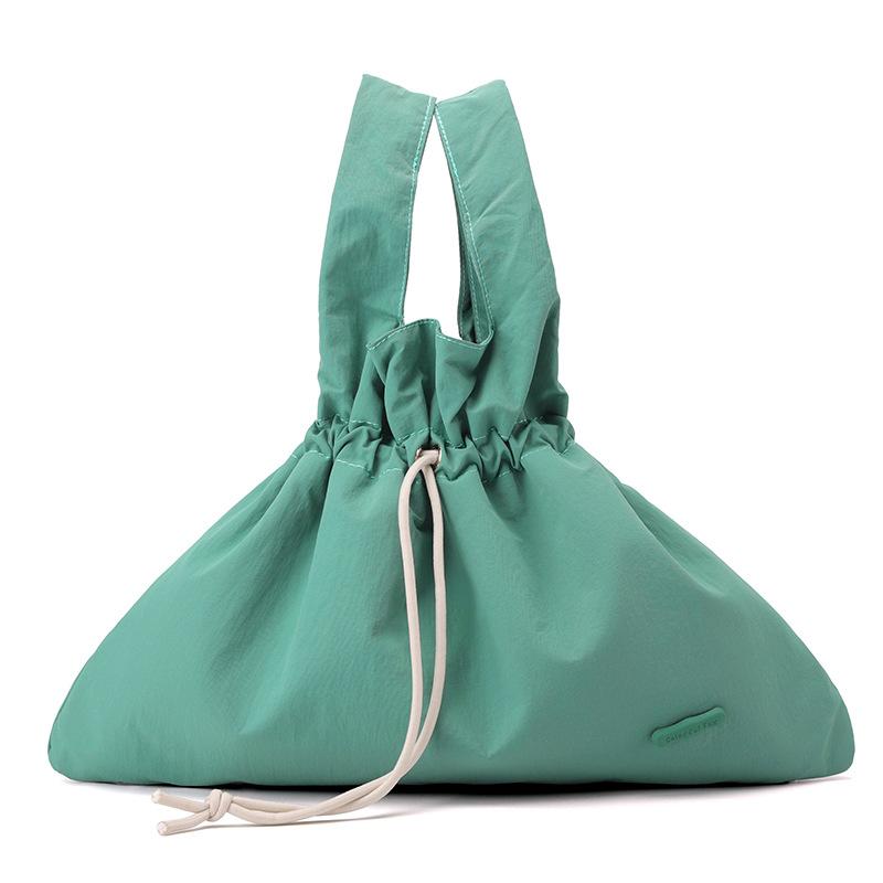 New Women's Retro Bundle Literary and Pastoral Handbag Solid Color Drawstring Commuter Bag