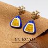 TB Classic Small Handbag with Copper-Plated Gold Enamel Earrings and Ceramic Oil Drop Design