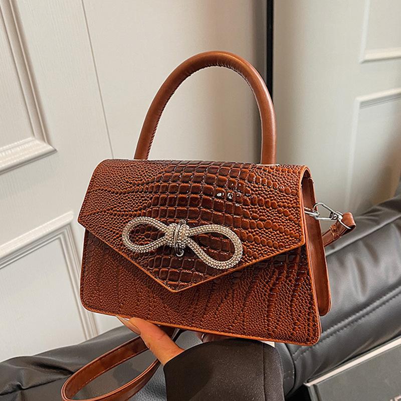 

Иностранный стиль простой однотонный бант швейная линия без моды повседневный косой через плечо портативный маленький квадрат женская сумка коричневый