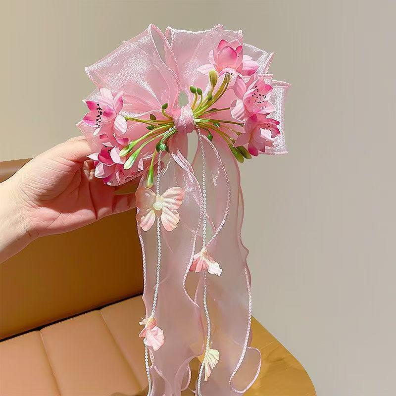 Dreamy Tassel Flower Headdress: Super Fairy Bow Mesh Hair Clip for Women