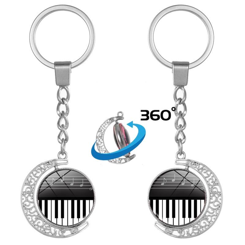 Heart-Shaped Rotating Piano Key Pendant Keychain with Gem and Musical Notes Ornament