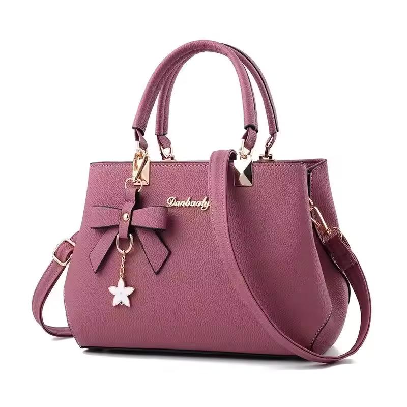 Eleganckie damskie torby listonoszki z wisiorkiem w kształcie kwiatka, torebki do pracy dla kobiet, czysta torebka dla kobiet, torby crossbody na ramię