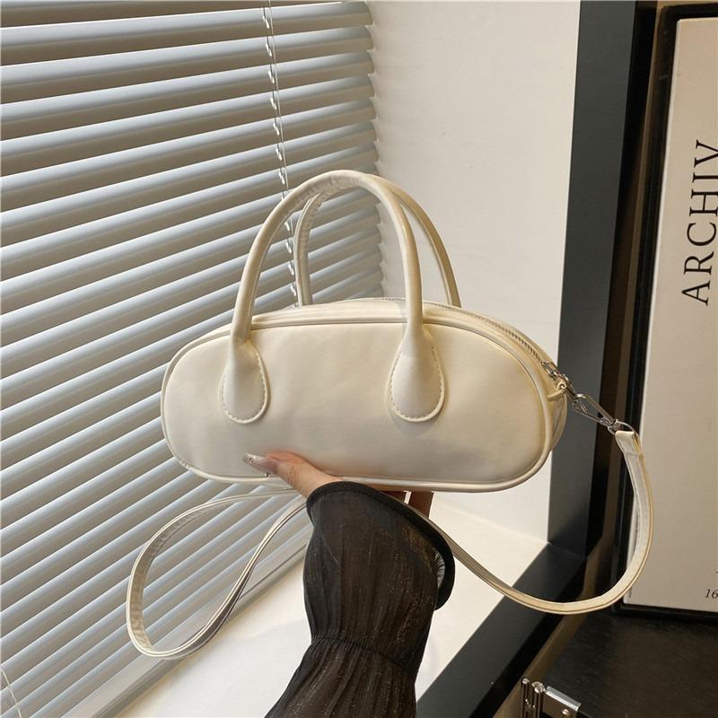 Niche design baguette bag portable small bowling bag shoulder messenger bag high sense