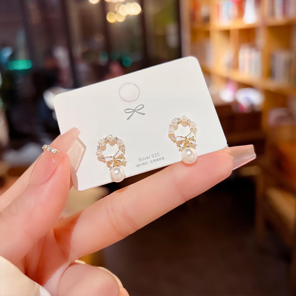 925 Silver Needle Unique Bow Pearl Daily Earrings Female High Sense of Luxury Earrings Niche Design Sense Earrings