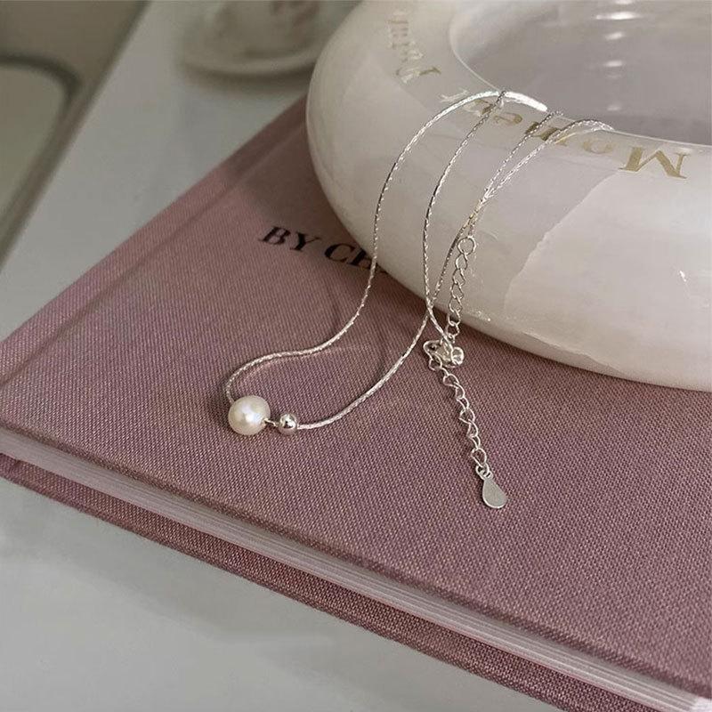 Minimalist Style Natural Freshwater Pearl Snake Bone Necklace with Summer Elegance, Luxury, and Superiority