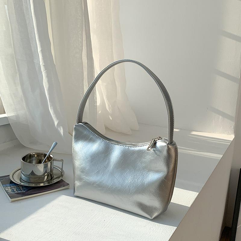 

Niche silver bag simple soft shoulder armpit bag women s solid color versatile high-end handbag срібний