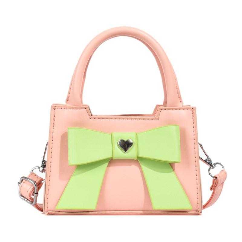Stylish Korean Toddler Shoulder Bag For Kids Featuring Chic Color Block Design And Sweet Bow Detail