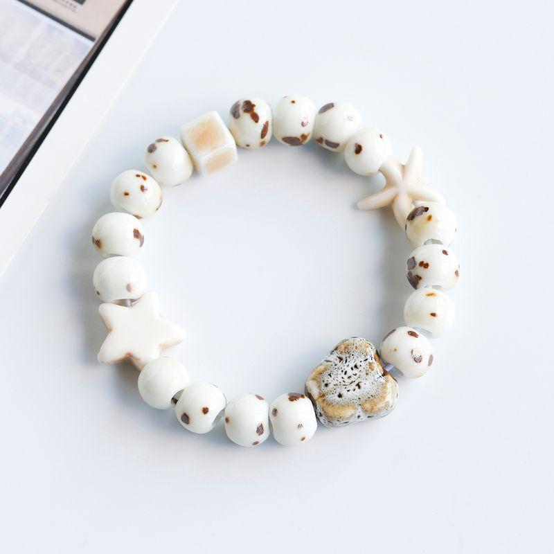 

Fresh Ceramic Bracelet Jingdezhen Porcelain Rose Beads Beaded Bracelet Couple Student Jewelry Female Stall Supply Small Jewelry Cow spot