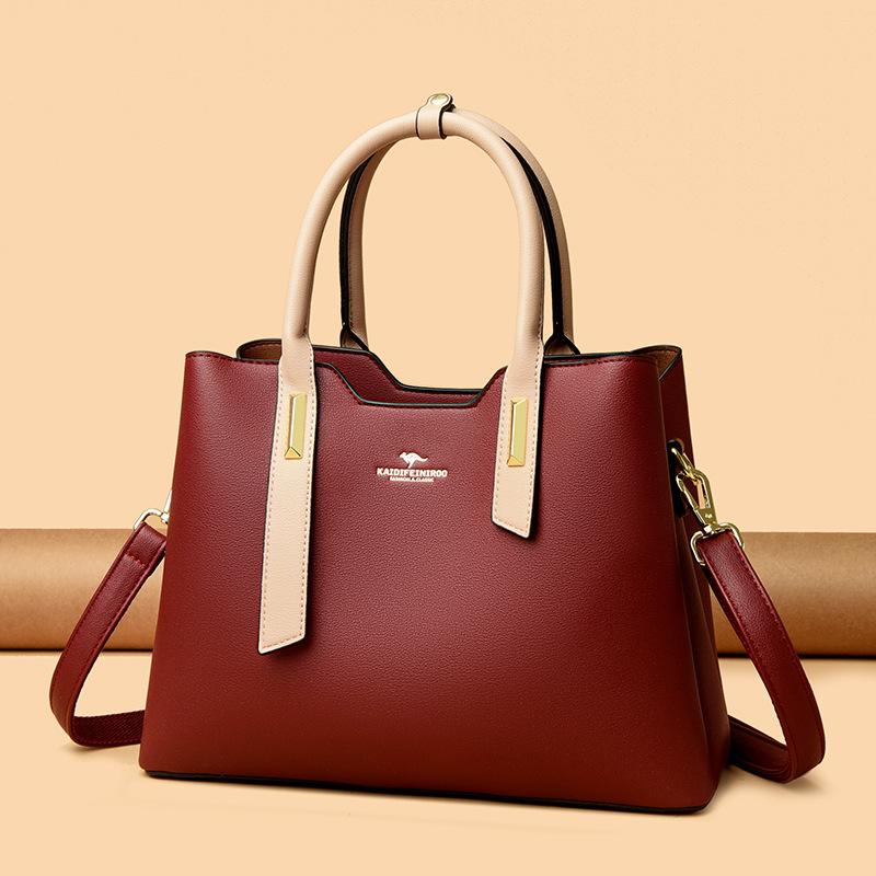 This Fashionable Color-blocking Bag Is Simple Elegant and Stylish for Ladies. It's A Hand-held Shoulder Bag