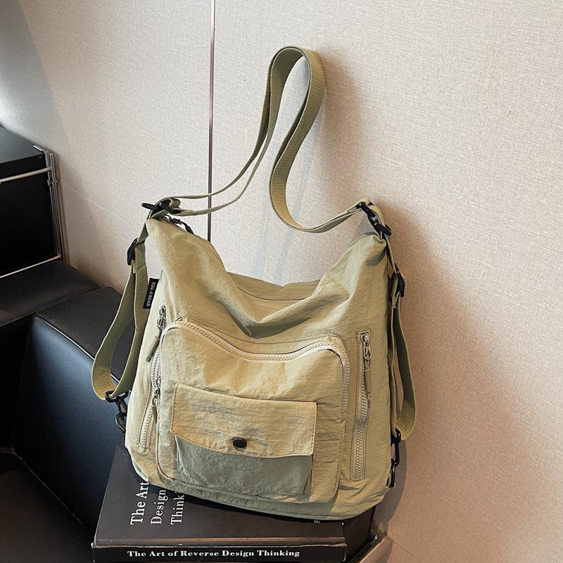 Casual backpack women's new versatile large-capacity women's high-end shoulder bag messenger bag