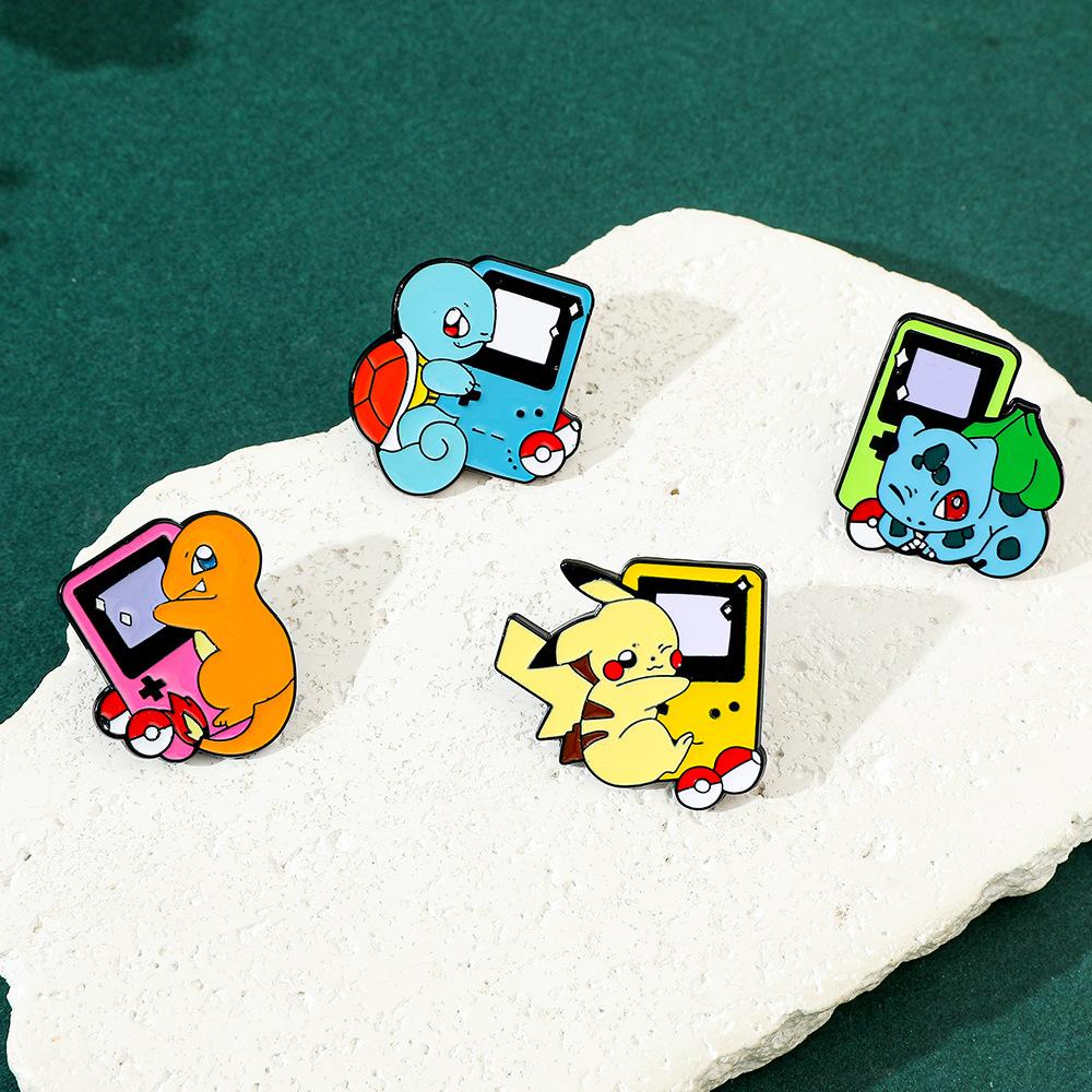 Console di gioco styling personalità creativa carina Spilla Pokémon Spilla metallica Pokémon accessorio spilla