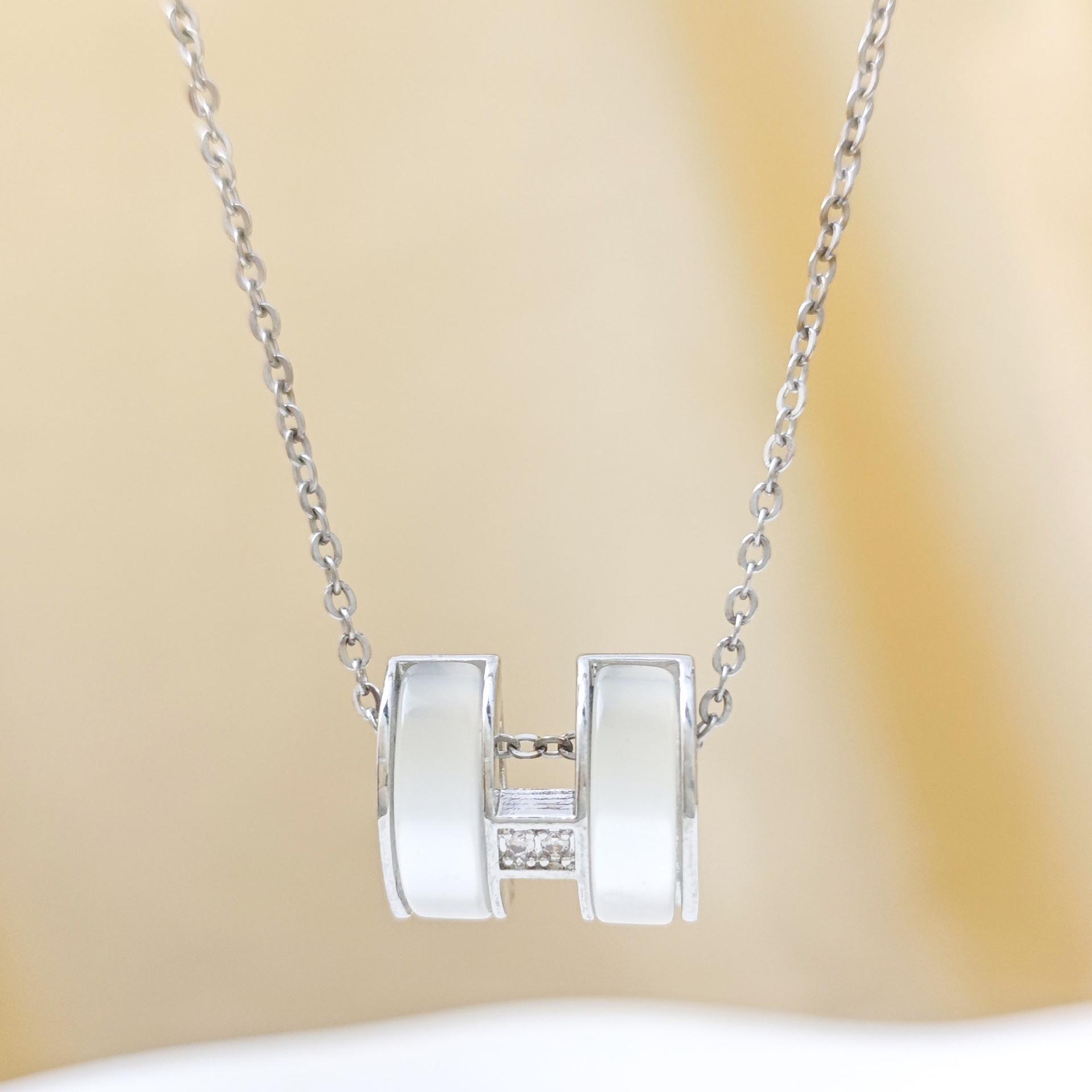 Women s Cat s Eye Stone  H  Pendant Necklace - Light Luxury Titanium Steel with Niche Design